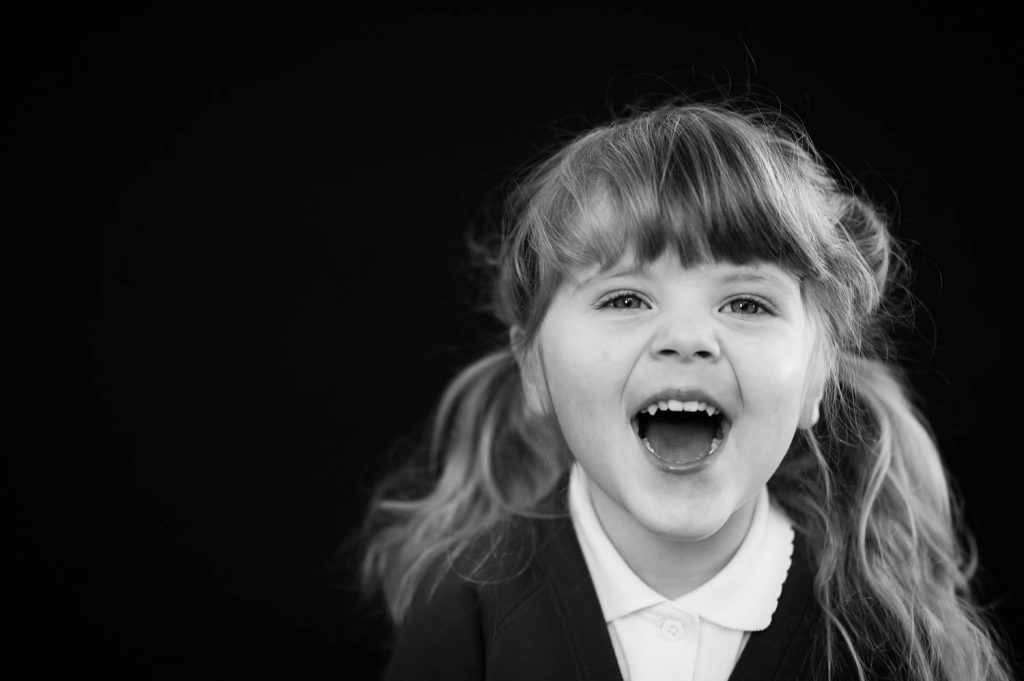 a girl with her mouth open